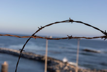 Beach With Barbed Wire
