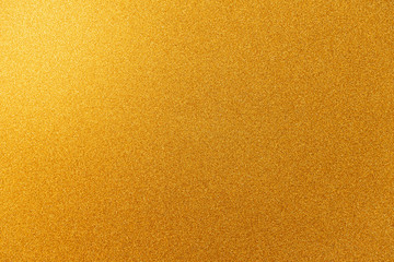 Wall Mural - abstract gold glitter paper texture background or backdrop. empty shimmer paper or yellow shiny pape