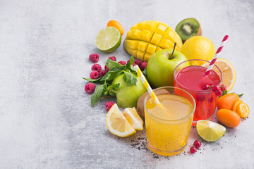 Wall Mural - Tropical detox drink with chia seeds, mango, lemon, raspberry