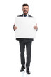 © Viorel Sima - smiling young businessman showing a blank board