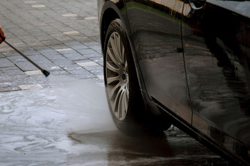 Self-service car wash. Wash high pressure water and foam.