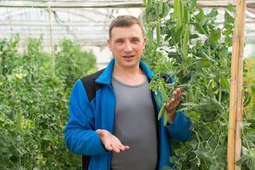 Male supervising growth of peas plants