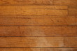 Weathered and damaged hardwood flooring, suitable for backgrounds or textures.