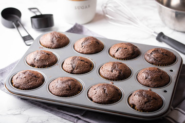 Canvas Print - chocolate cupcake on iron pan