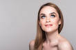 © dianagrytsku - Beautiful Woman Face Portrait Beauty Skin Care Concept Beautiful beauty young female model girl touching her face skin cheeks hands fingers.