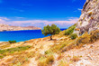Sea skyview landscape photo near Agia Agathi beach and Feraklos castle on Rhodes island, Dodecanese, Greece. Panorama with sand beach and clear blue water. Famous tourist destination in South Europe