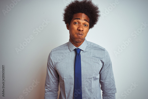 American Business Man With Afro Hair Wearing Shirt And Tie Over