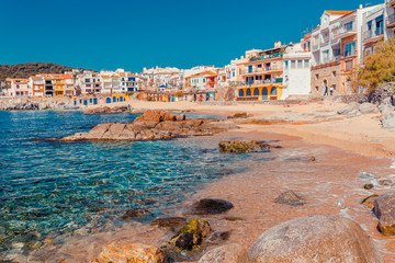 Wall Mural - Sea landscape with Calella de Palafrugell, Catalonia, Spain near of Barcelona. Scenic fisherman village with nice sand beach and clear blue water in nice bay. Famous tourist destination in Costa Brava