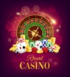 Casino roulette wheel, golden coins and chips