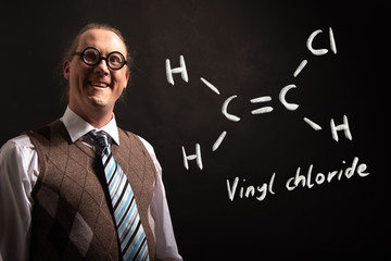 Professor presenting handdrawn chemical formula of vinyl chloride