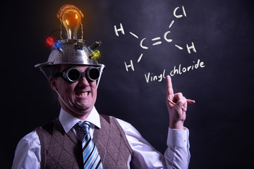 Nerd presenting handdrawn chemical formula of vinyl chloride