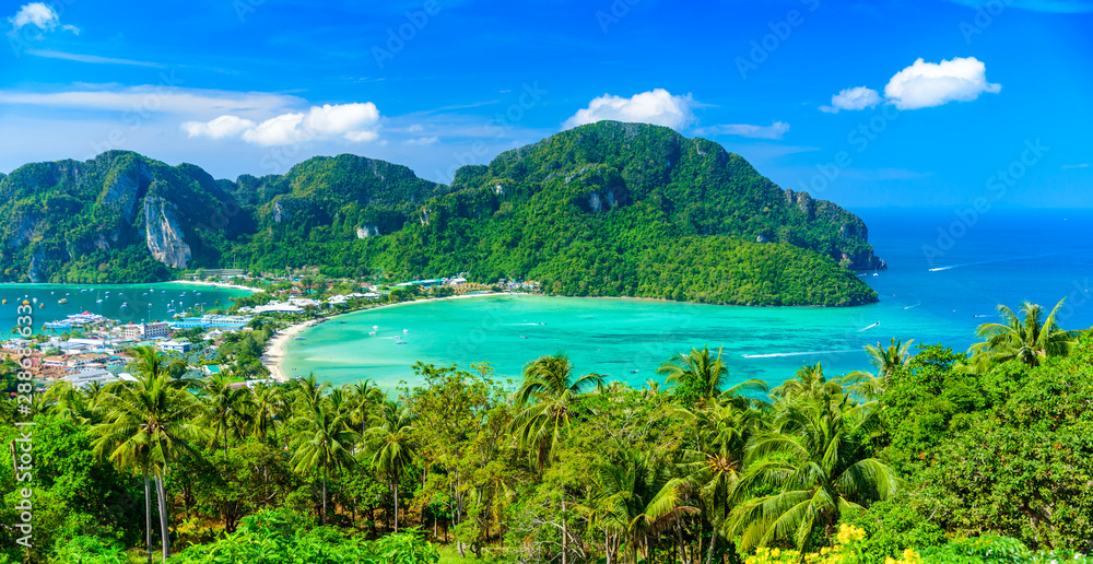 Koh Phi Phi Don, Viewpoint - Paradise bay with white beaches. View from the top of the tropical island over Tonsai Village, Ao Tonsai, Ao Dalum. Krabi Province, Thailand. - obrazy, fototapety, plakaty 