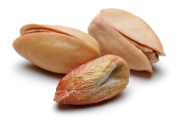 Poster - Fresh pistachio nuts isolated on white background