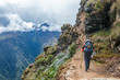 © nomadkate - Young hiker man trekking with backpack in Peruvian Andes mountains, Peru, South America