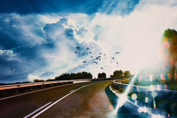 Wall Mural - landscape image related to car travel adventures.road and car travel scenic and sunset.