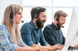 © yurolaitsalbert - employees of the business center in the accessories sitting at the Desk