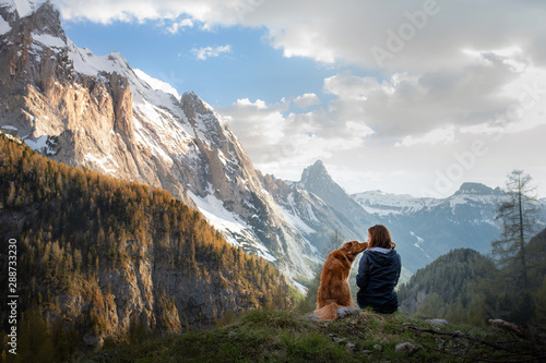 girl with a dog in the mountains Wallpaper Mural