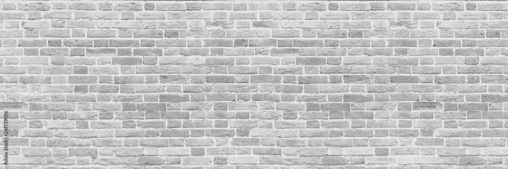 Panoramic background of wide old white brick wall texture. Home or ...