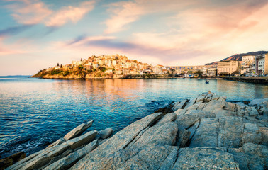 Wall Mural - Stunning spring seascape of Aegean Sea. Beautiful sunrise in Kavala city, Macedonia, Greece, Europe. Traveling concept background. Orton Effect.