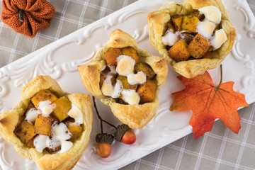 Wall Mural - Puff pastry cup filled with pumpkin.