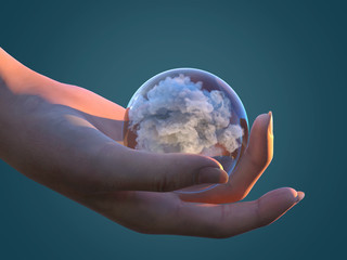 Wall Mural - human hand holds a transparent sphere with cloud inside