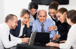 © JackF - Office managers having a productive day at work