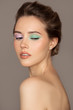 © yuriyzhuravov - Fashion portrait of young woman. Colorful eye shadows. Perfect skin.