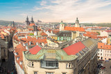 Fototapeta  - Beautiful view of the Old Town Square, and Tyn Church and St. Vitus Cathedral in Prague, Czech Republic