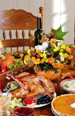 Sticker - dishes for Thanksgiving. young turkey, cranberry sauce, pumpkin pie. sunny weather, the sun's rays illuminate the dishes. sunny autumn day.