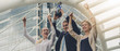 © Mongkolchon - business background of business people in business wear are cheerful for being winner in business competition contest with hand holding trophy and award cerfiticate
