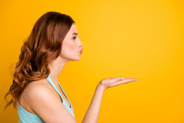 Canvas Print - Copyspace photo of ginger foxy charming beautiful attractive nice cute gorgeous sweet pretty girlfriend sending an air kiss to someone wearing teal singlet isolated with yellow vivid color background