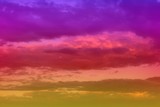 Fototapeta Zachód słońca - beautiful unreal vivid fantasy sun colored clouds in the sky for using in design as background.
