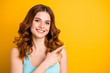 © deagreez - Copyspace close up photo of charming sweet cute nice attractive girlfriend pointing at empty space wearing turquoise tank-top while isolated with yellow vibrant color background
