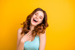© deagreez - Photo of cheerful positive charming pretty lovely sweet girlfriend wearing turquoise singlet laughing sincerely while isolated over vivid color background