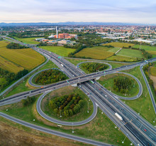 Cloverleaf Interchange Seen From Above. Aerial View Of Highway Road Junction In The Countryside. Bird's Eye View.