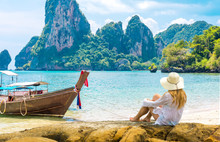 Beautiful Woman On Paradise Ao Nang Krabi Thailand Beach With Llongtail Boat. Adventure, Travel, Relax, Holiday, Vacation, Luxury Concept.