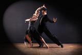 Fototapeta Big Ben - dancers in ballroom isolated on black background