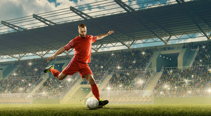 Professional soccer player in action with a ball during the match on a soccer field. Crowded tribunes with cheering fans