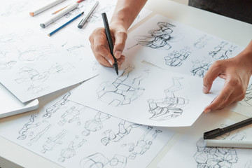 Wall Mural - Animator designer Development designing drawing sketching development creating graphic pose characters sci-fi robot Cartoon illustration animation video game film production , animation design studio.