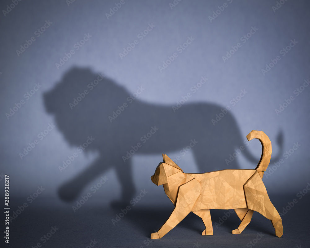 Concept of hidden potential. A paper figure of a cat that fills the shadow of a lion. 3D illustration - obrazy, fototapety, plakaty 