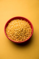 Poster - Salty and Fried Moong Dal Namkeen served in a bowl, selective focus