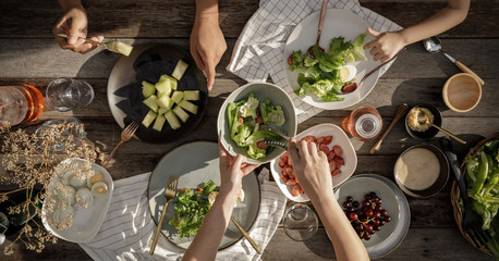 Woman and man dinner with organic salad, Food healthy organic vegetable concept with top view