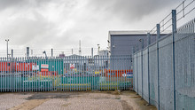 Great Yarmouth, Norfolk, UK – September 08 2019. Metal Security Fence Around The Perimeter Of An Industrial Unit In The Southtown Road Region Of Great Yarmouth