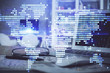 © peshkova - Multi exposure of business theme icons and table with computer background. Concept of success.