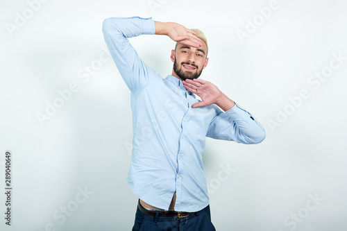 Man With Blond Hair Black Beard Over Isolated White Background