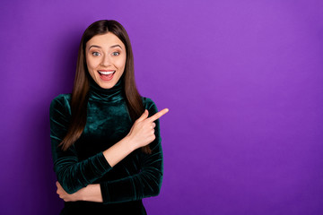 Wall Mural - Portrait of astonished millennial screaming shouting wow omg isolated over purple violet background