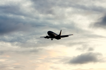 Wall Mural - air plane in sunset sky