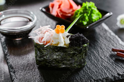 Gunkan With Crab Meat And Masago Caviar Asian Cuisine Restaurant Dish Menu Item Traditional Oriental Food National Japanese Cooking Delicious Sushi Seafood On Wooden Platter Closeup Stock Photo Adobe Stock