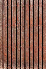 Wall Mural - Textured antique rustic vertical planks with peeling paint are nailed with old rusty nails. Creative trendy modern texture background.