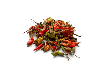 Mixed dried red and green chilies isolated on white background 